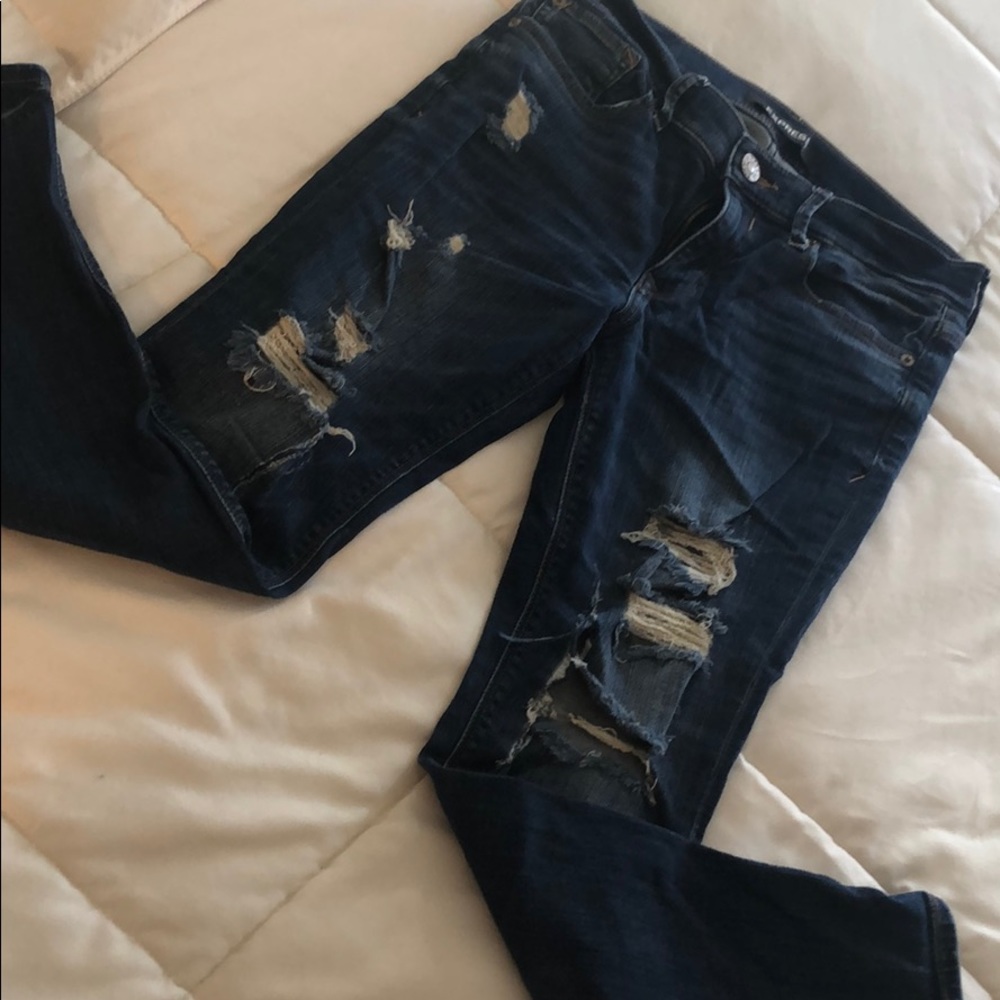 Express legging distressed mid rise jeans